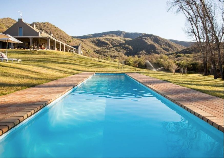 Views of Wildhondkloof Lodge looking up from pool